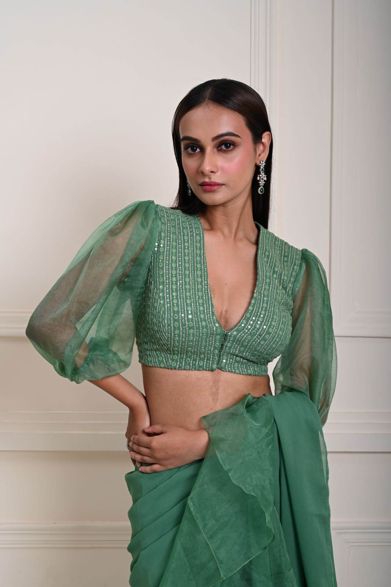 V-neck embroidered blouse with Bishop Sleeves and ruffle detailing