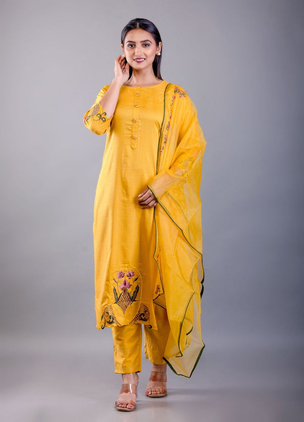 front view showing straight-cut silhouette and green embroidered yoke