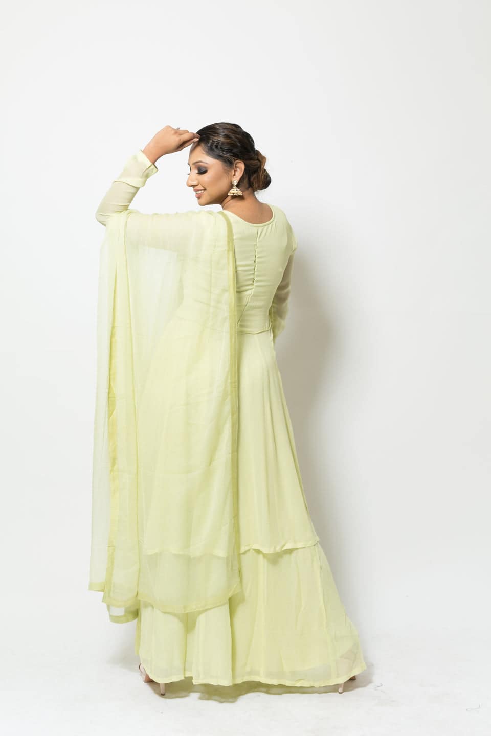 Festive light green georgette Sharara set with embroidered Kurta, round neck, and flowing design