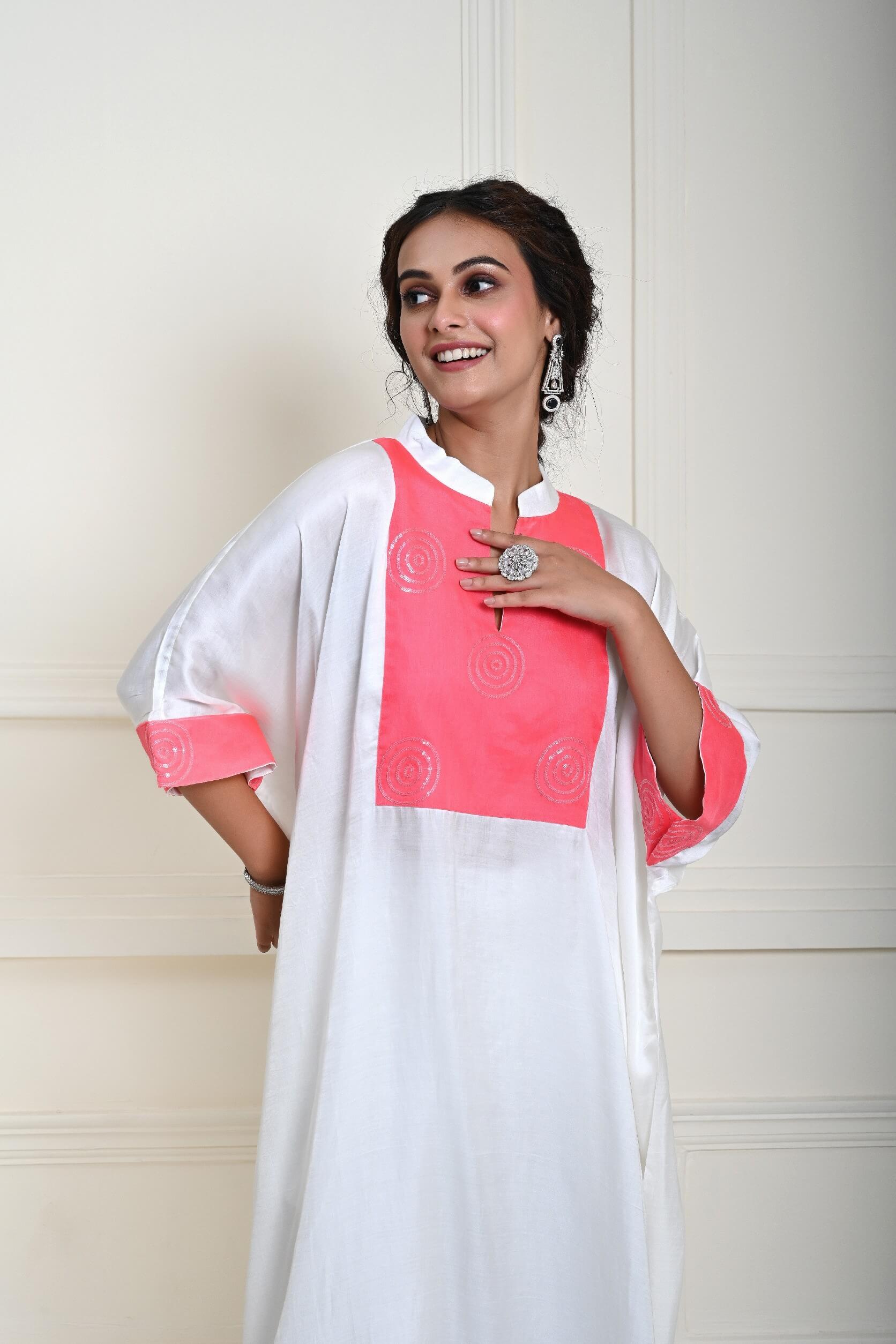 Trendy white georgette kaftan kurti set with embroidery work, ideal for weddings and celebrations