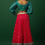 Luxurious Jacquard Pink Banarasi Lehenga Set with Peacock Blue Embroidered Choli
