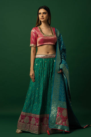 Green Banarasi Weave Lehenga with Contrasting Pink Brocade Choli