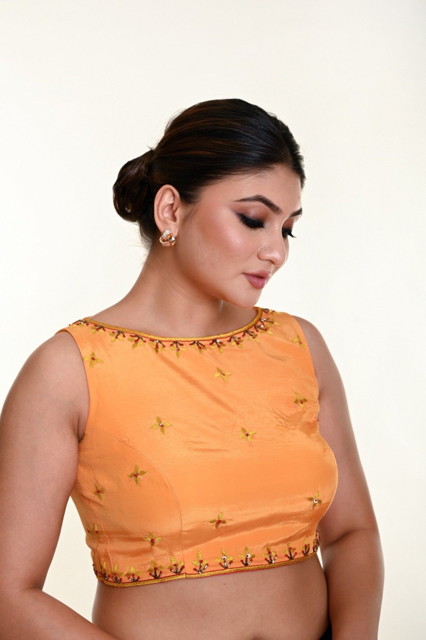 Butter Yellow Sleeveless Blouse in Crepe Silk with Hand Embroidery work - Anvi Couture