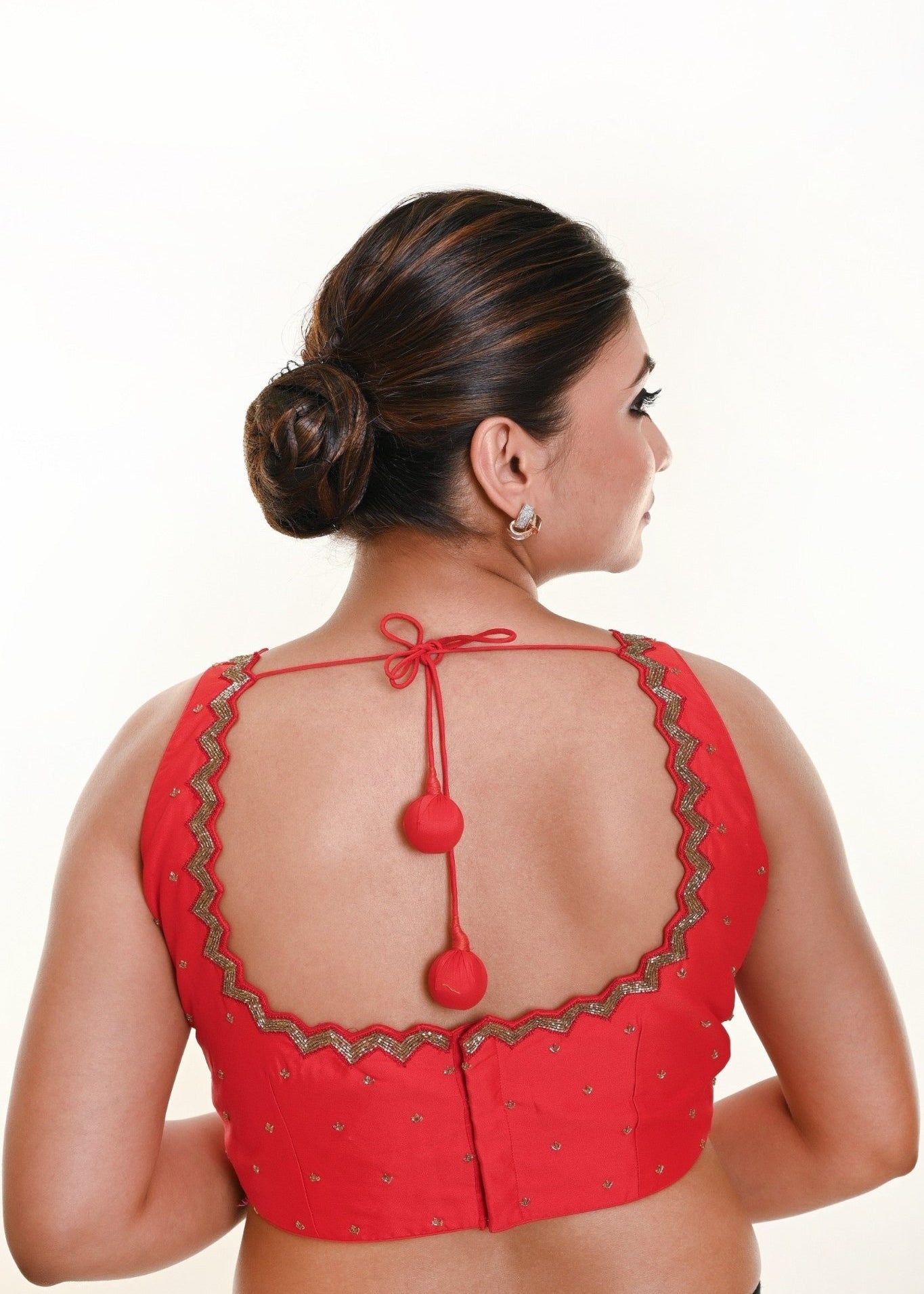 Bright Red Sleeveless Blouse in Silk with Cutdana Embroidered with Tassel - Anvi Couture