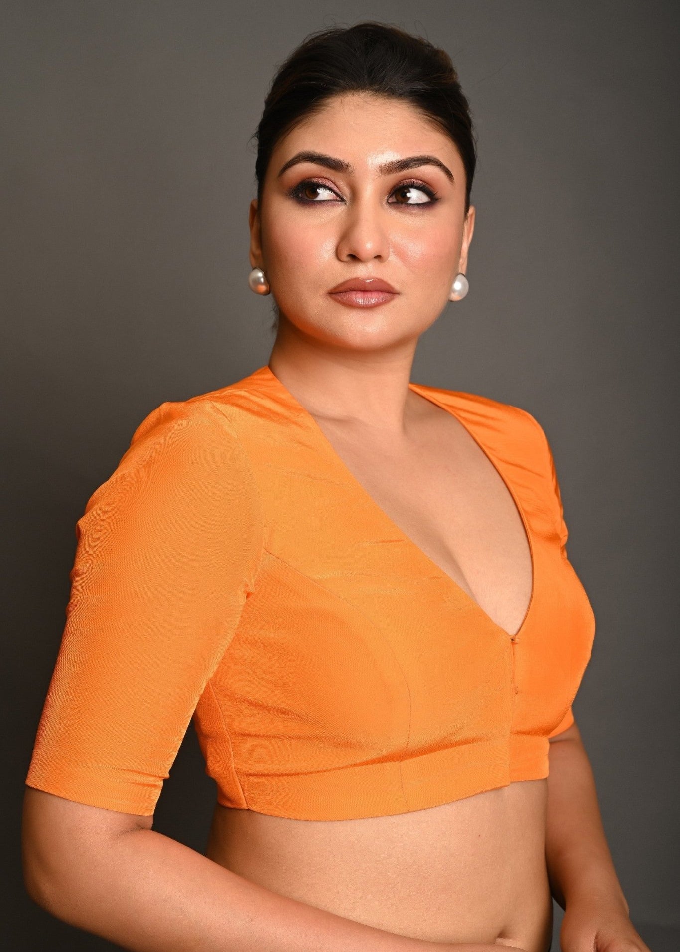 Bright Orange Blouse with Plunging Curved V - Neckline and Half Sleeves - Anvi Couture