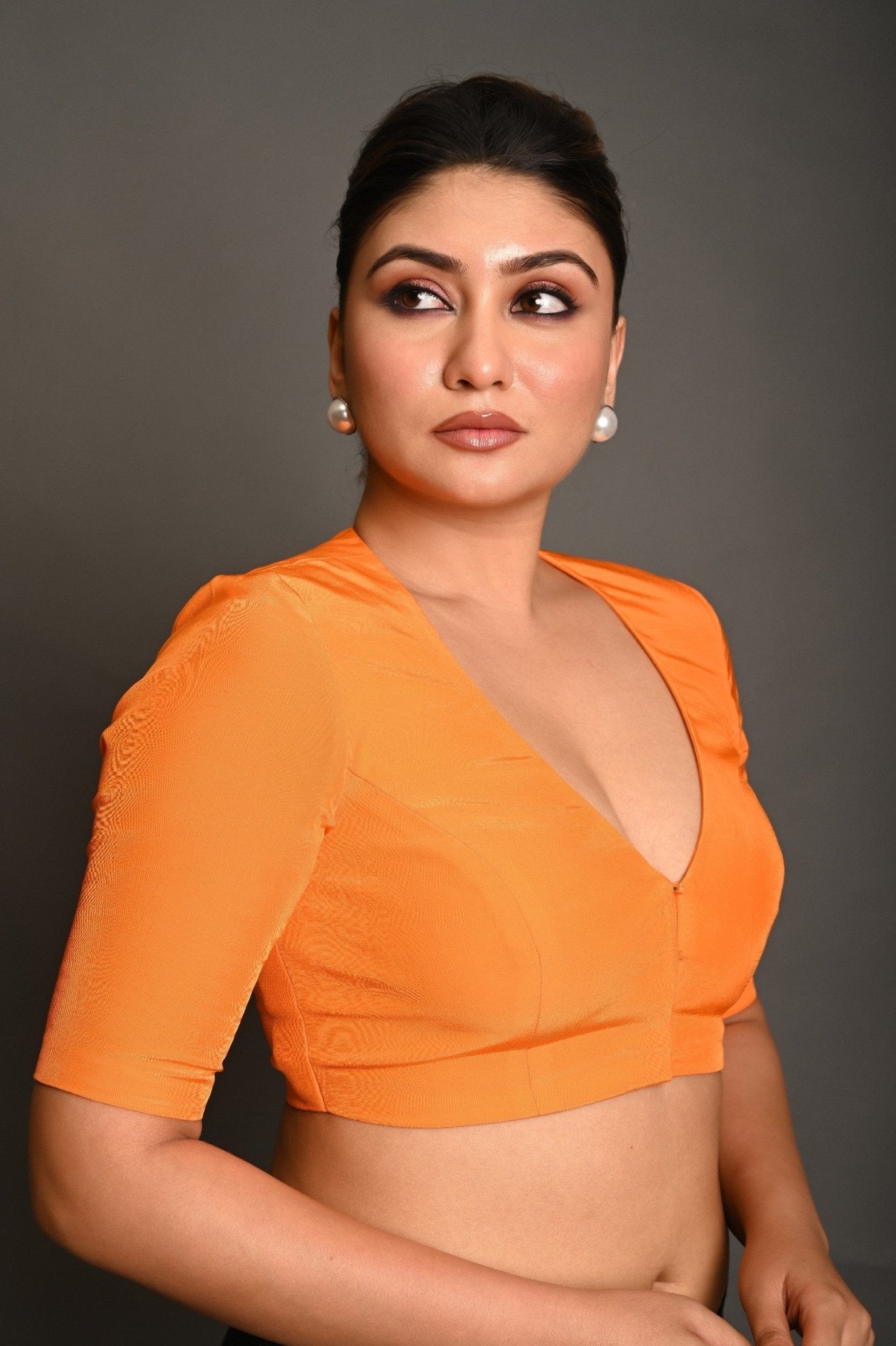 Bright Orange Blouse with Plunging Curved V - Neckline and Half Sleeves - Anvi Couture
