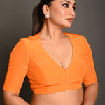 Bright Orange Blouse with Plunging Curved V - Neckline and Half Sleeves - Anvi Couture