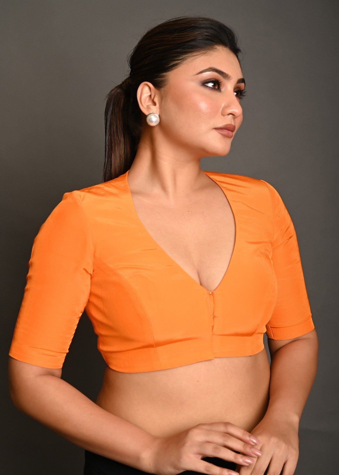 Bright Orange Blouse with Plunging Curved V - Neckline and Half Sleeves - Anvi Couture