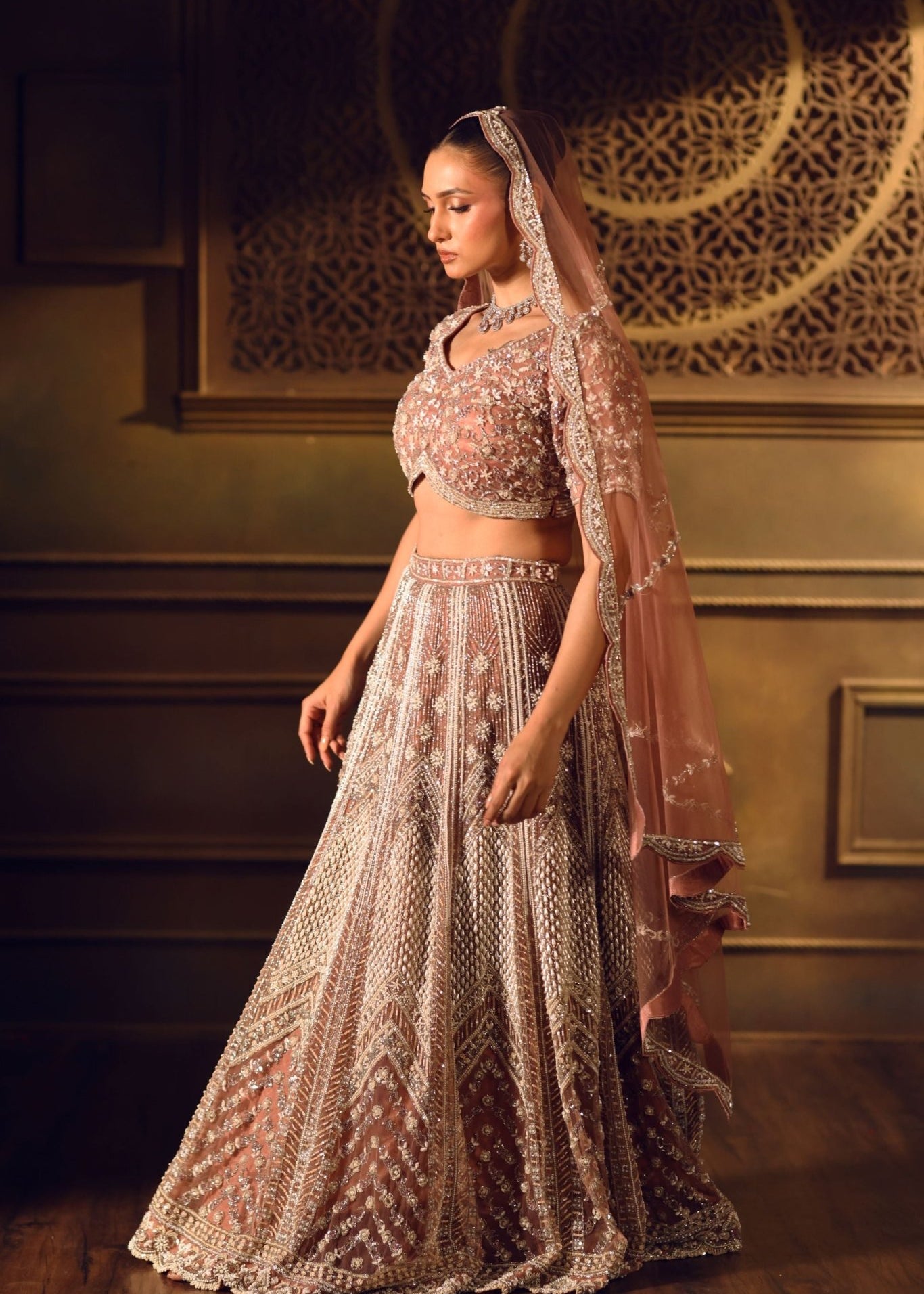 Dusty Pink Bridal Lehenga Set in Net with All Over Embroidery and Dupatta - Anvi Couture