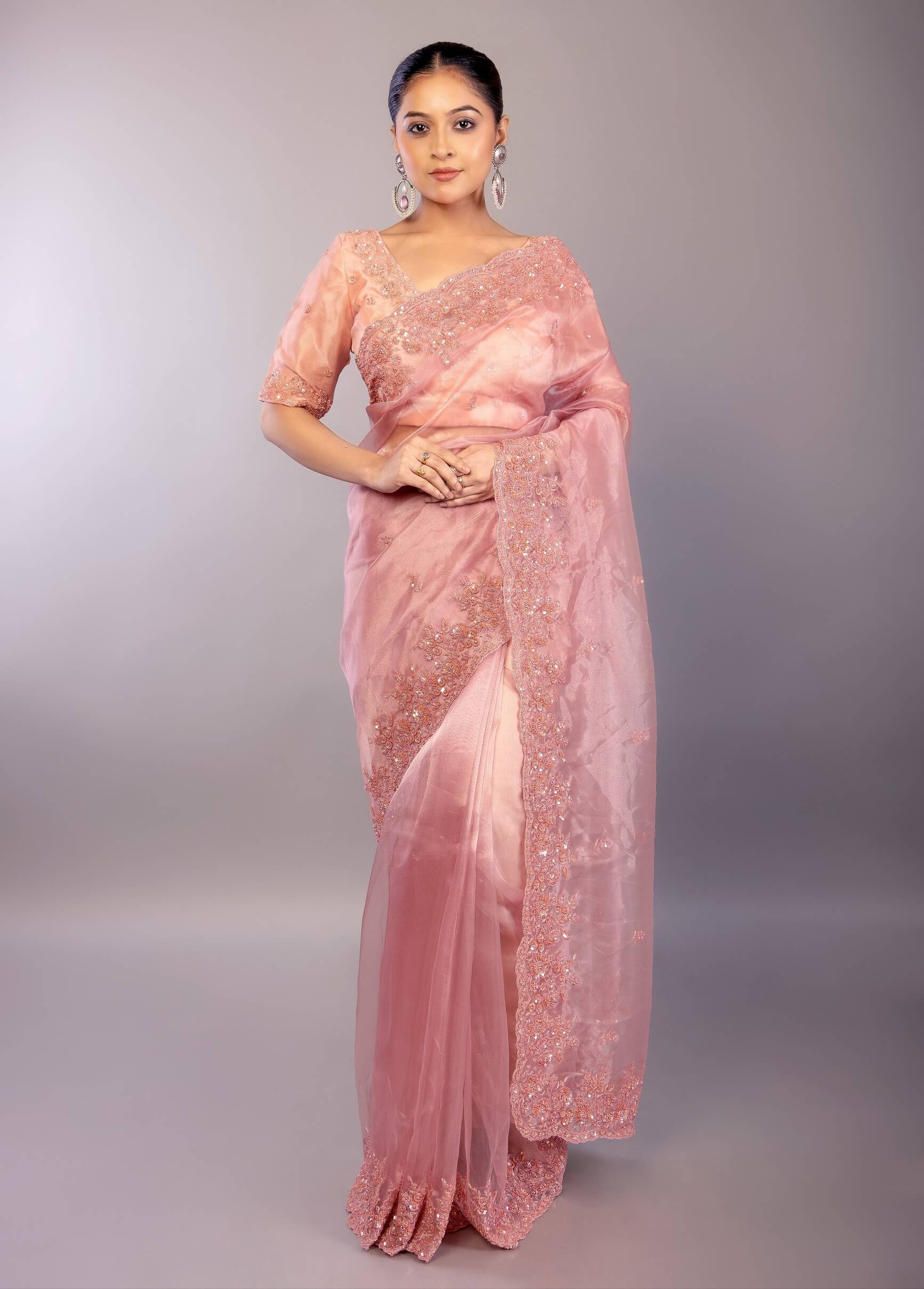 Pastel Pink Organza Saree with Hand Embroidered Border 
