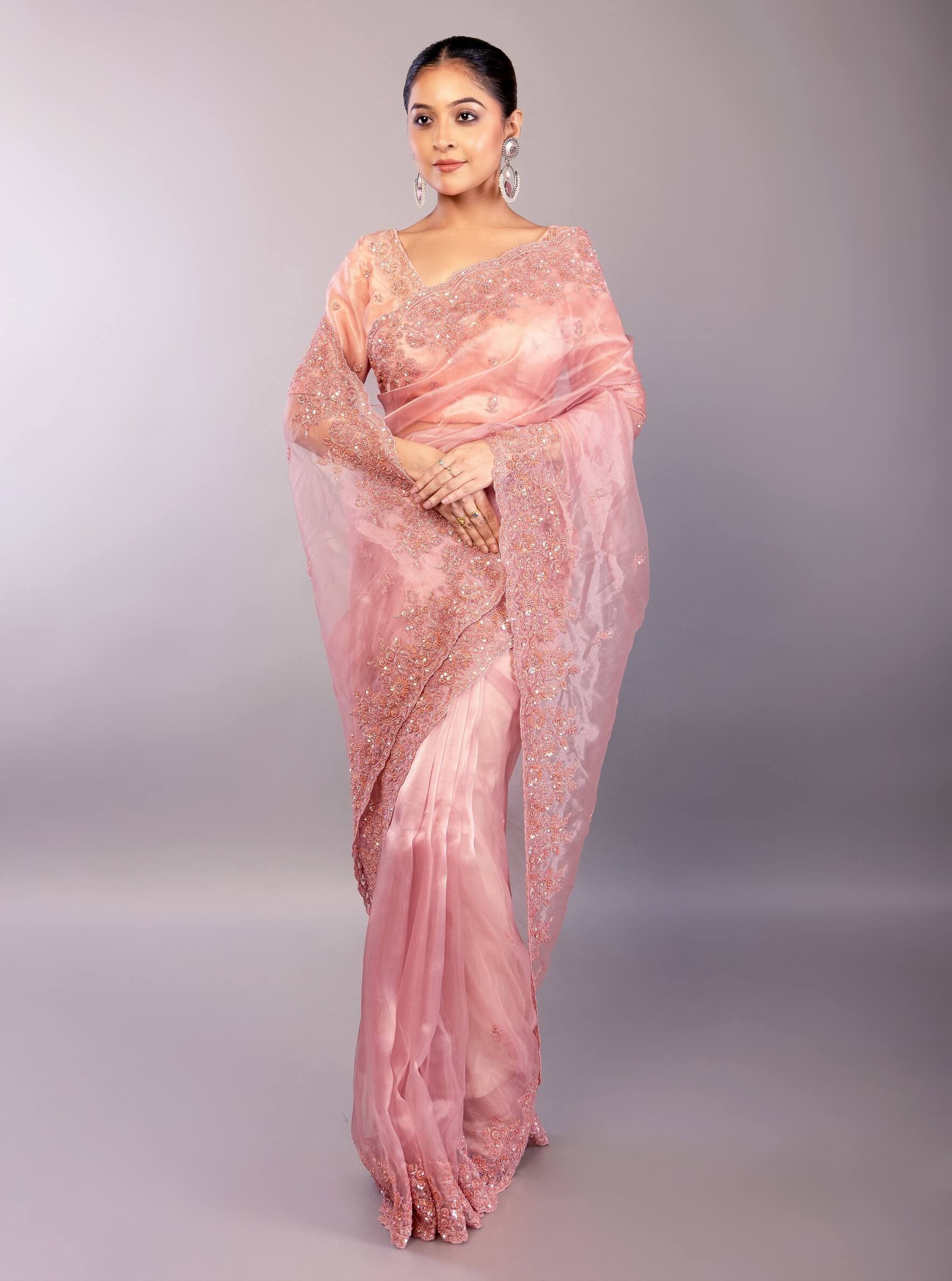 Pastel Pink Organza Saree with Hand Embroidered Border 
