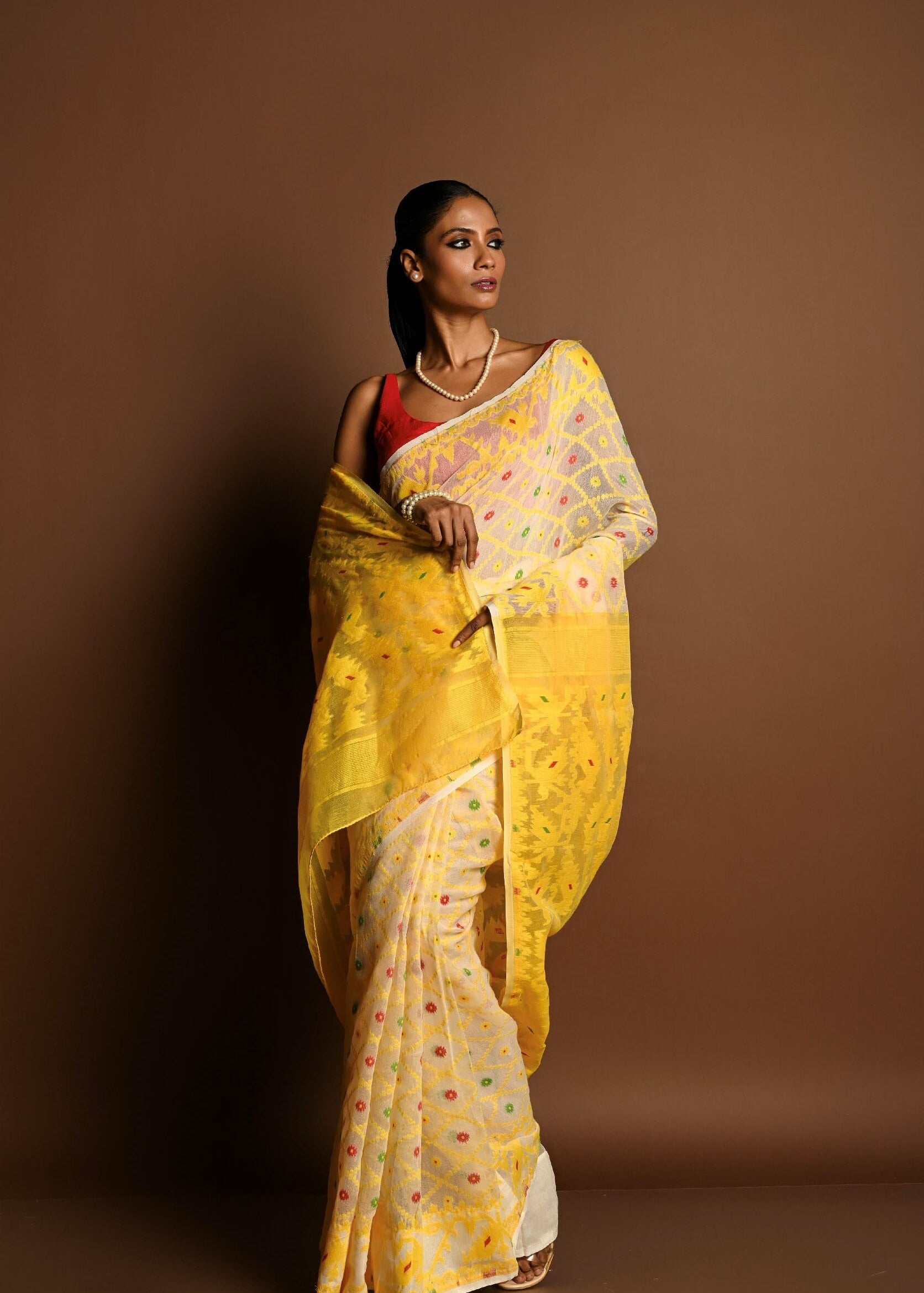 Yellow Pure Tant Jamdani Saree with All Over Red and Green Buta - Anvi Couture