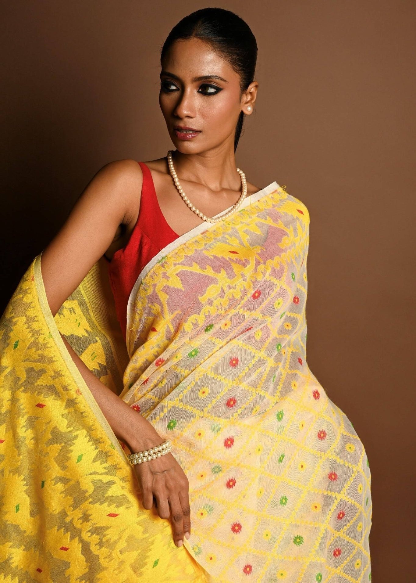 Yellow Pure Tant Jamdani Saree with All Over Red and Green Buta - Anvi Couture