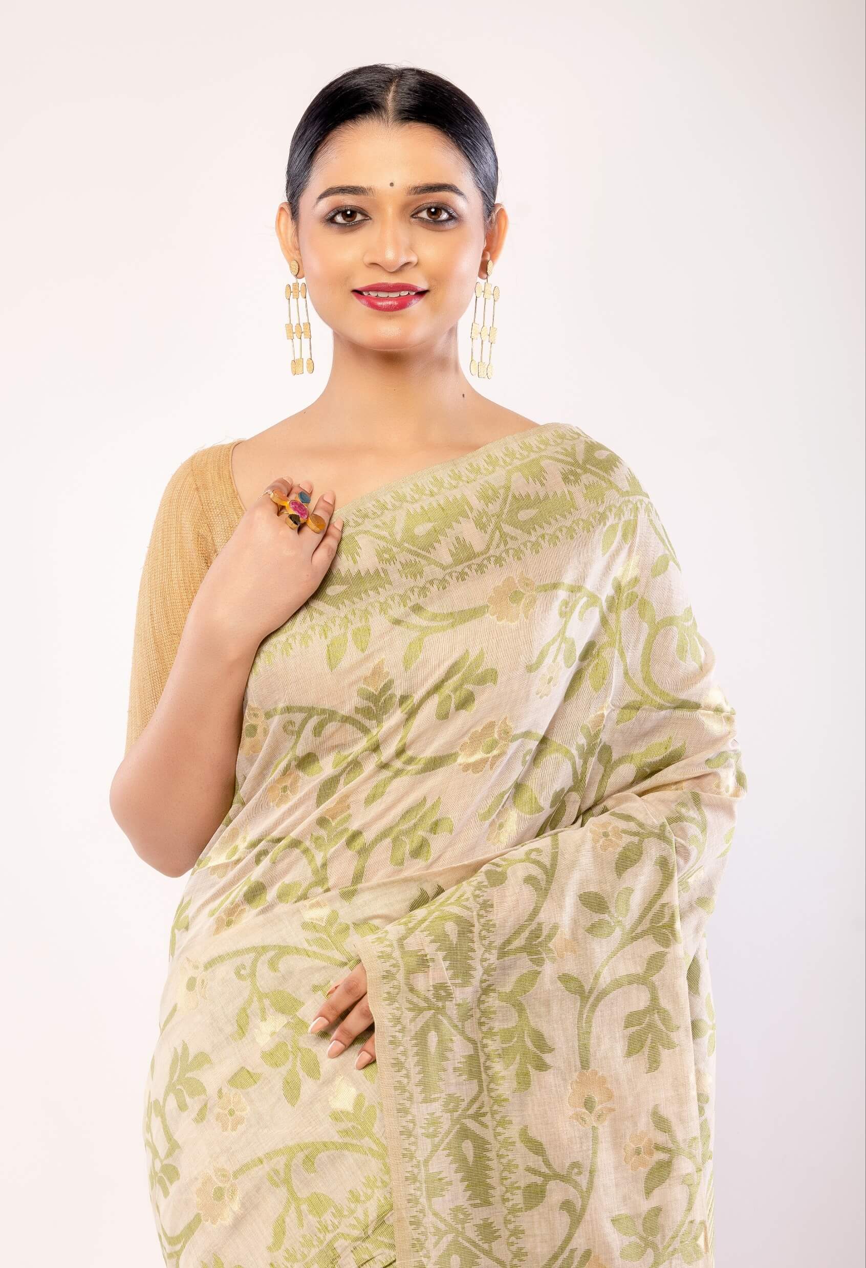 Off - White Jamdani Saree with All - Over Green and Gold Floral Motifs - Anvi Couture