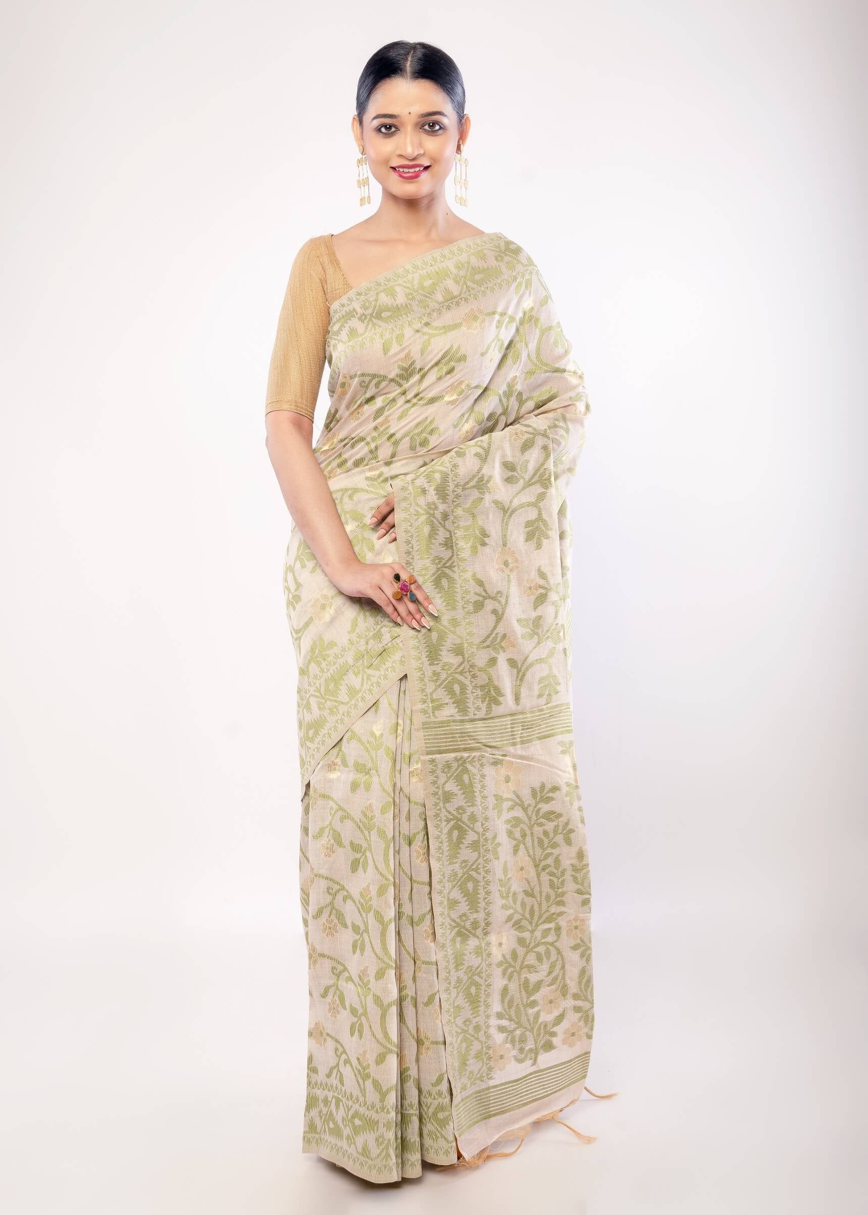 Off - White Jamdani Saree with All - Over Green and Gold Floral Motifs - Anvi Couture