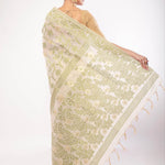 Off - White Jamdani Saree with All - Over Green and Gold Floral Motifs - Anvi Couture