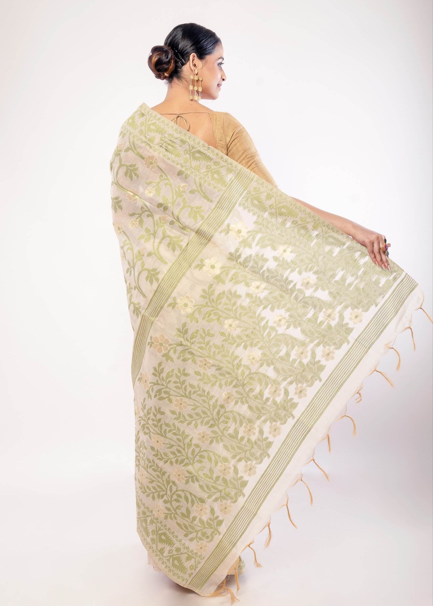 Off - White Jamdani Saree with All - Over Green and Gold Floral Motifs - Anvi Couture