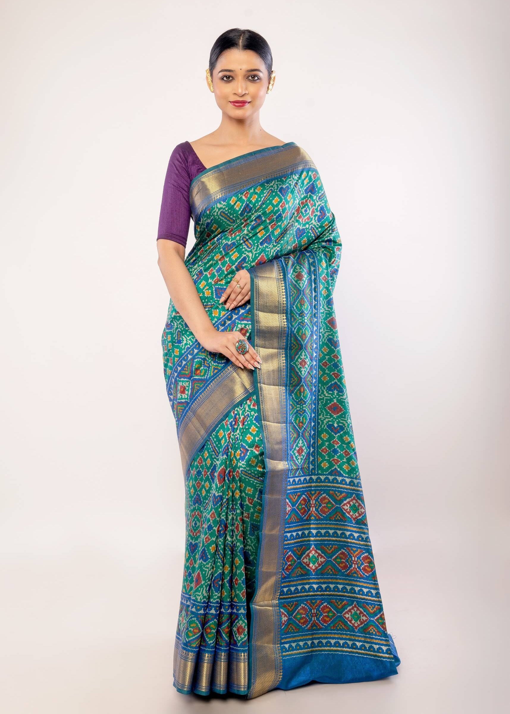 Green Patola Silk Saree with Gold Border - Anvi Couture