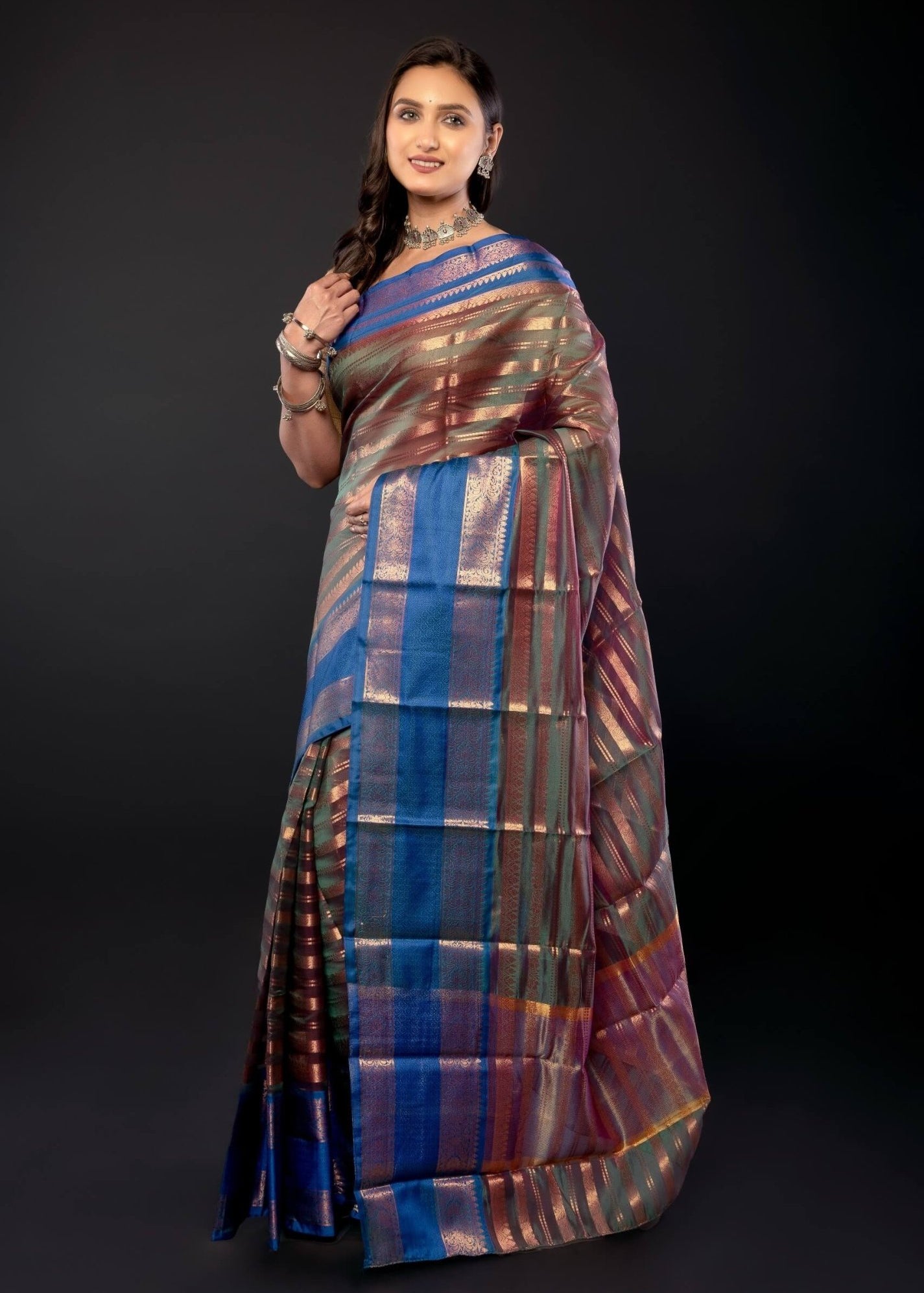 Peacock Green Organza Saree Gold stripes and Blue Border - Anvi Couture