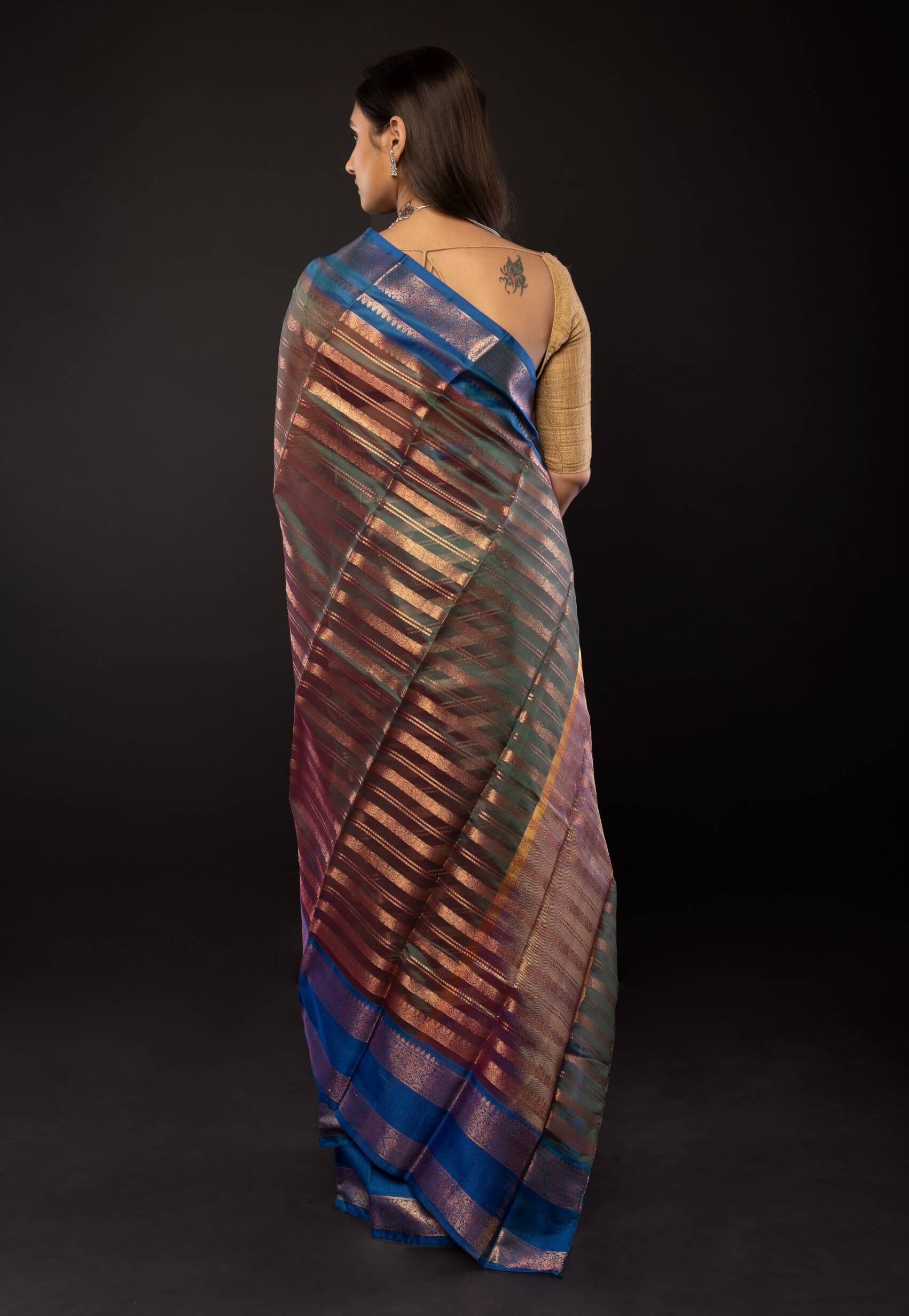 Peacock Green Organza Saree Gold stripes and Blue Border - Anvi Couture