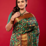 Green Patola Silk Saree with Contrasting Maroon and Gold Zari Border - Anvi Couture