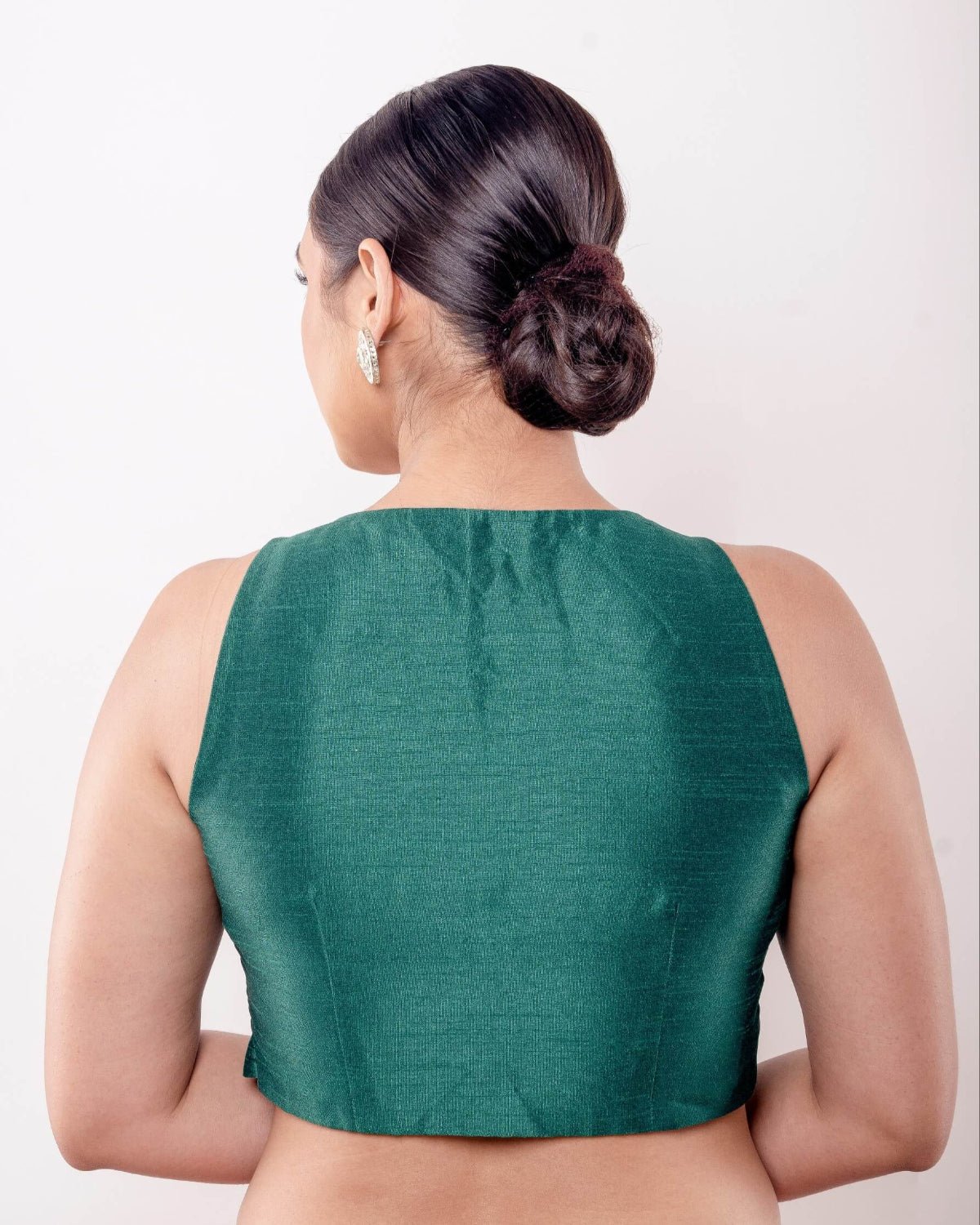 Green Sleeveless Blouse in Raw Silk with U Neckline and Front Closure - Anvi Couture