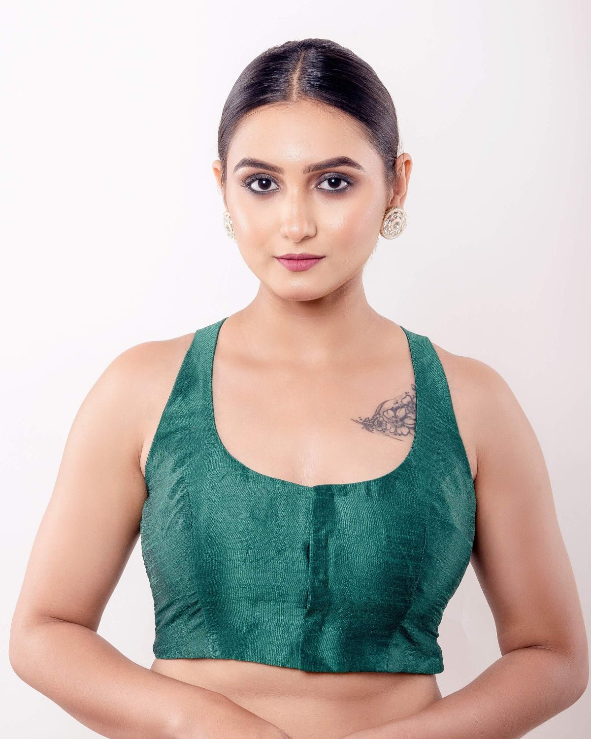 Green Sleeveless Blouse in Raw Silk with U Neckline and Front Closure - Anvi Couture