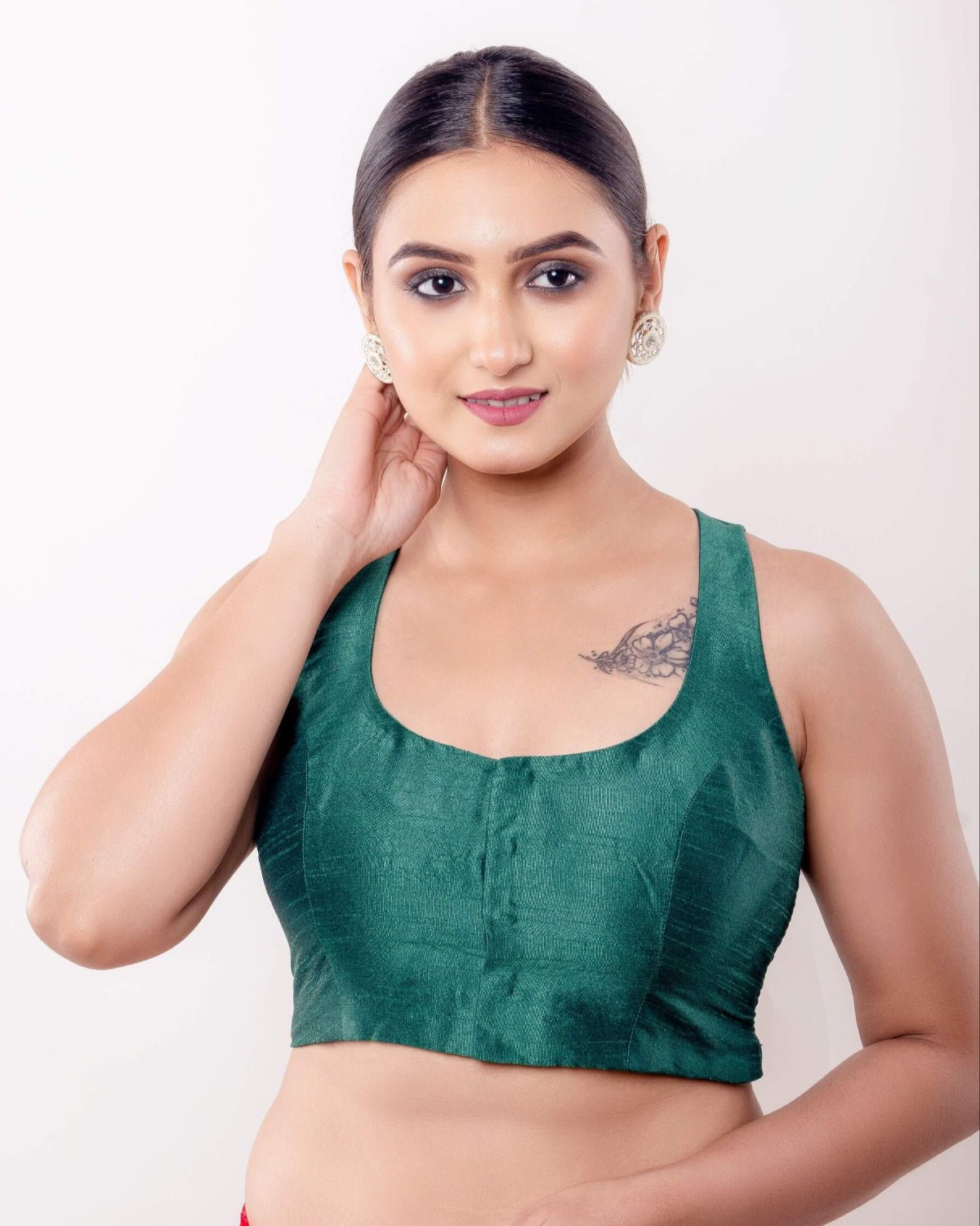 Green Sleeveless Blouse in Raw Silk with U Neckline and Front Closure - Anvi Couture