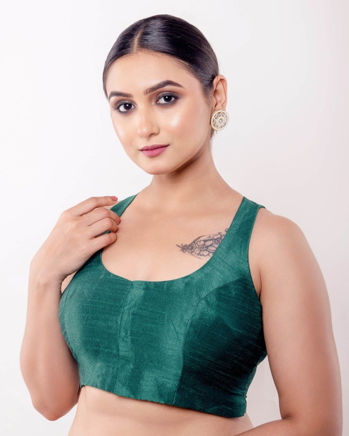 Green Sleeveless Blouse in Raw Silk with U Neckline and Front Closure - Anvi Couture