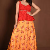 Yellow Floral Lehenga with Contrasting Red Peplum Choli - Anvi Couture