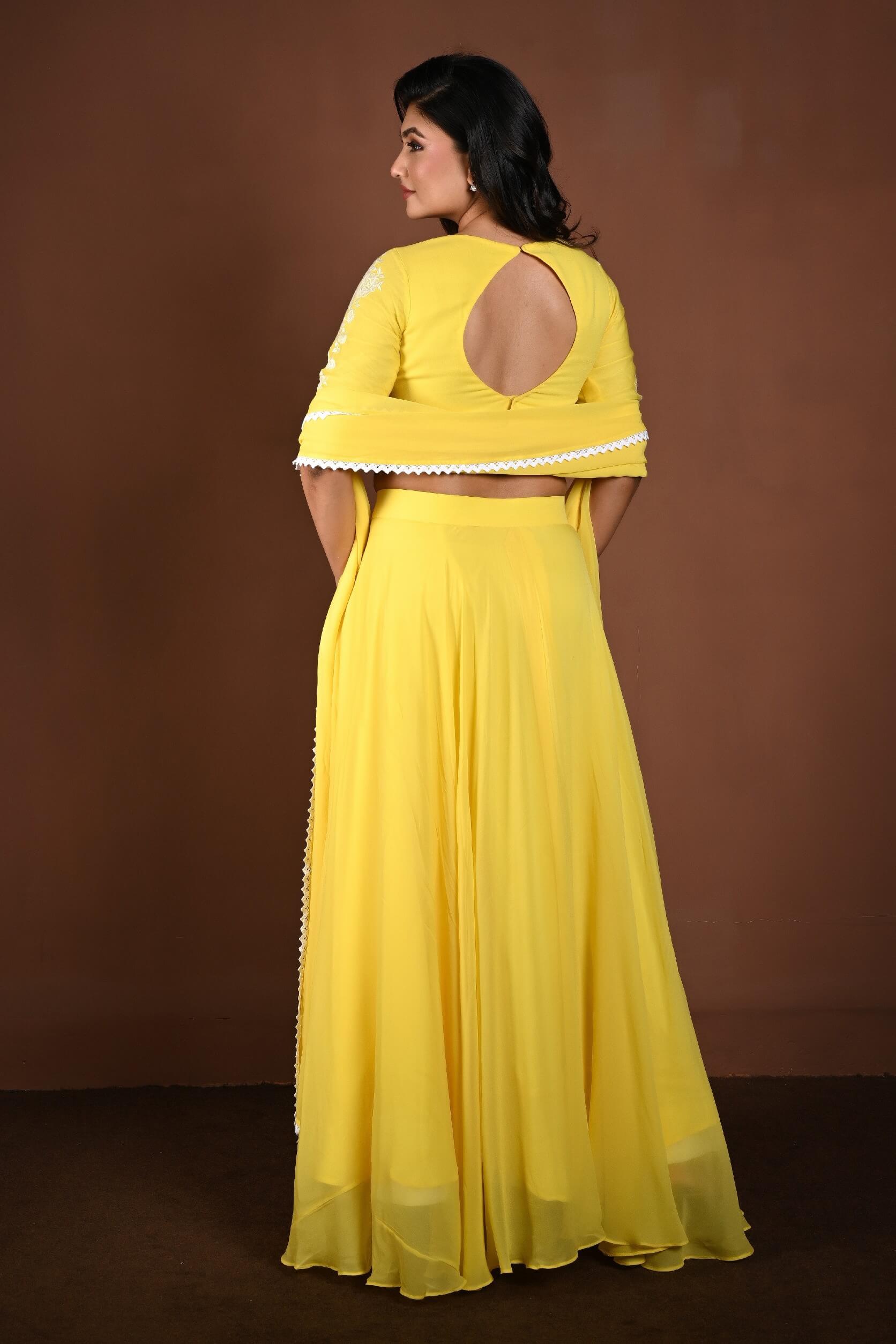 Yellow Georgette Lehenga Set with Embroidered Top with White Lace Dupatta - Anvi Couture