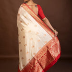 White Katan Silk Saree with Contrasting Red Border and Gold Zari Work - Anvi Couture