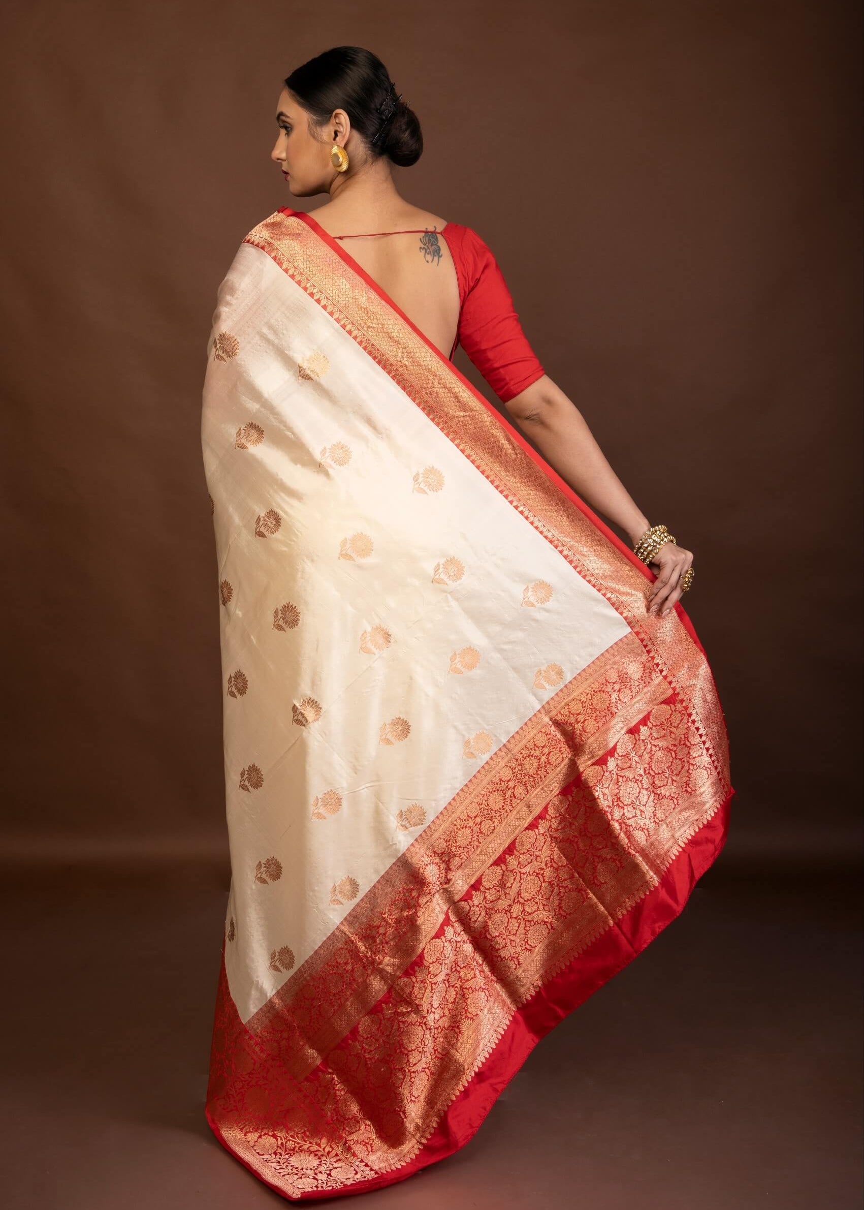 White Katan Silk Saree with Contrasting Red Border and Gold Zari Work - Anvi Couture