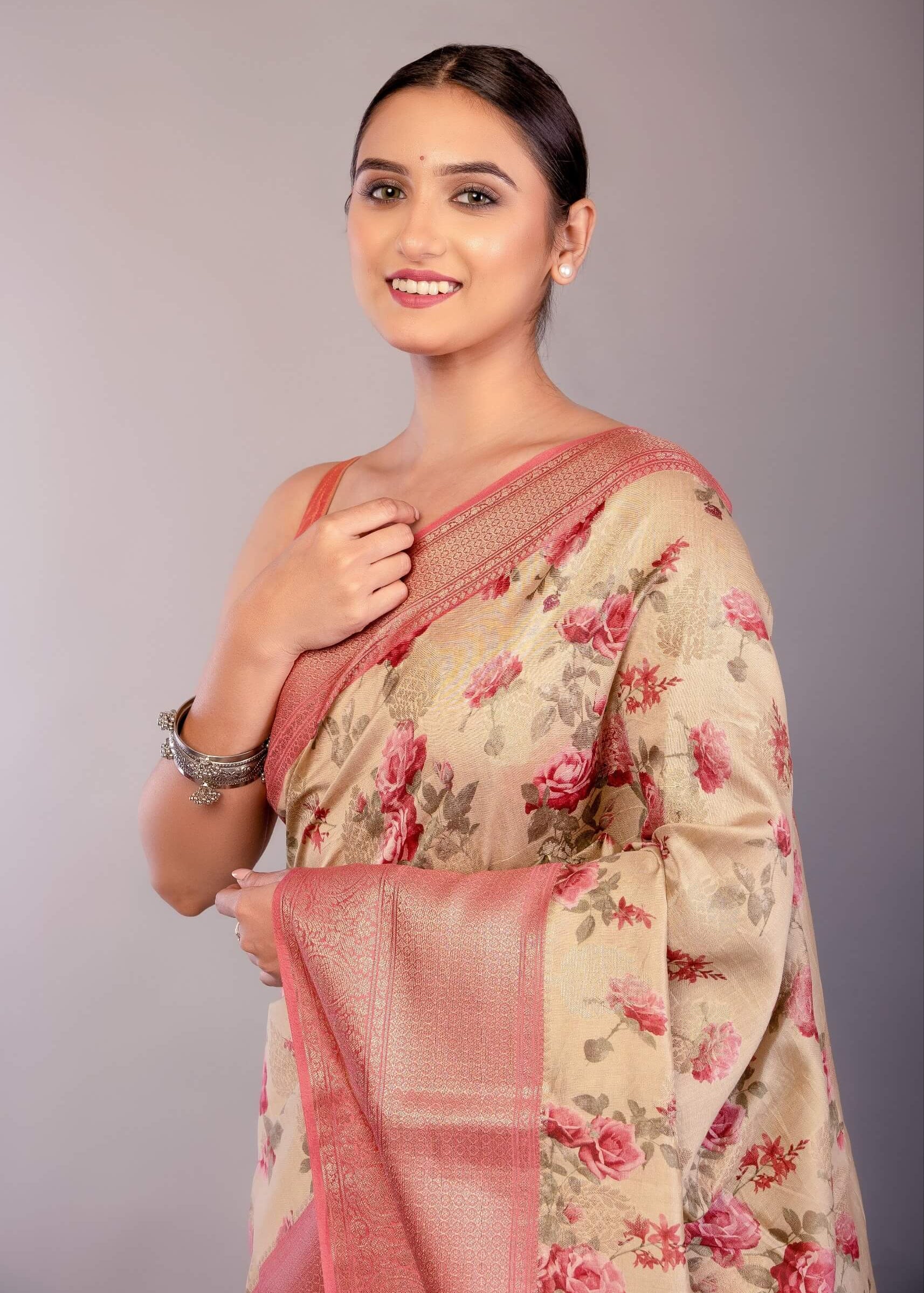 Cream White Silk Saree with Floral Prints and Contrasting Pink Zari Border - Anvi Couture