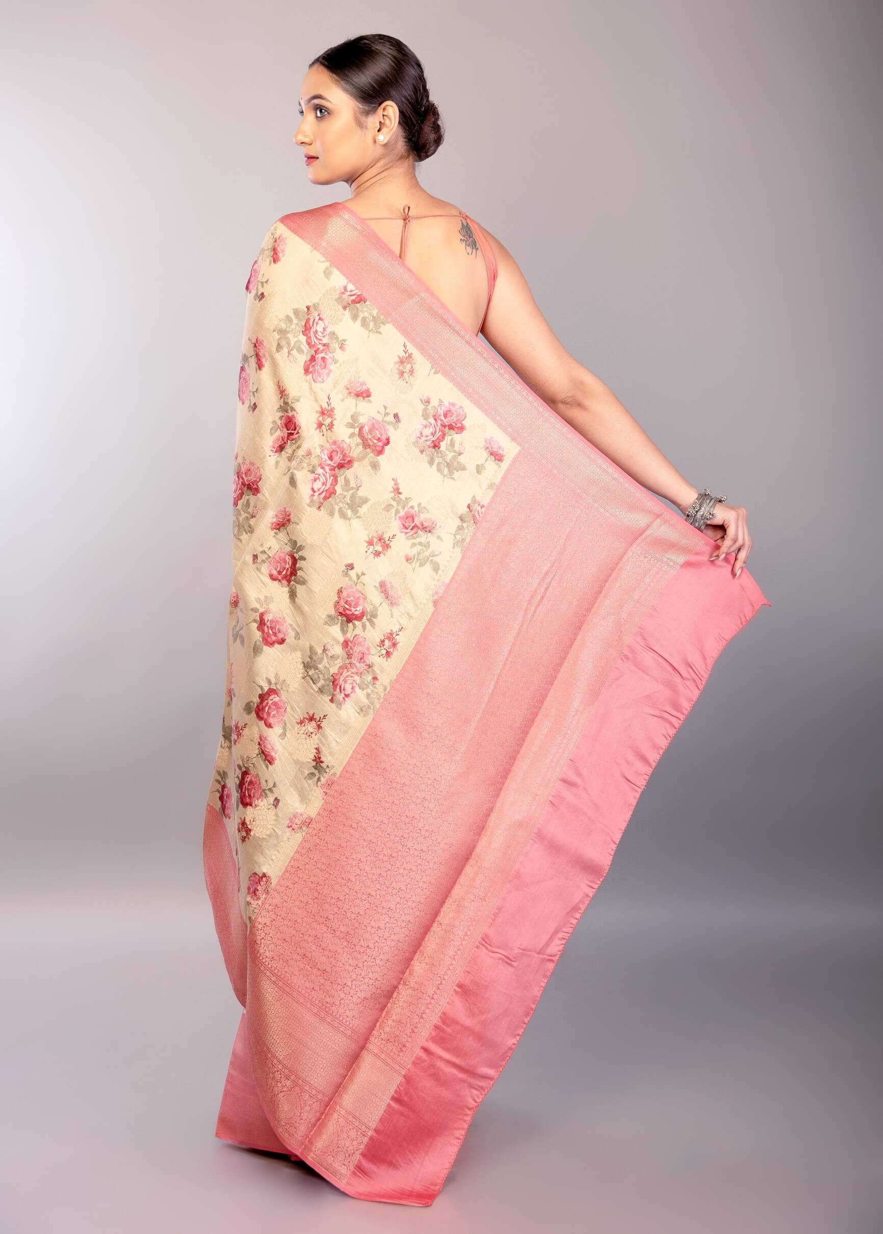 Cream White Silk Saree with Floral Prints and Contrasting Pink Zari Border - Anvi Couture