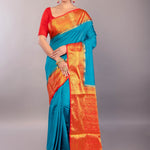 Bright Blue South Indian Silk Saree with Contrasting Orange Border and Pallu - Anvi Couture