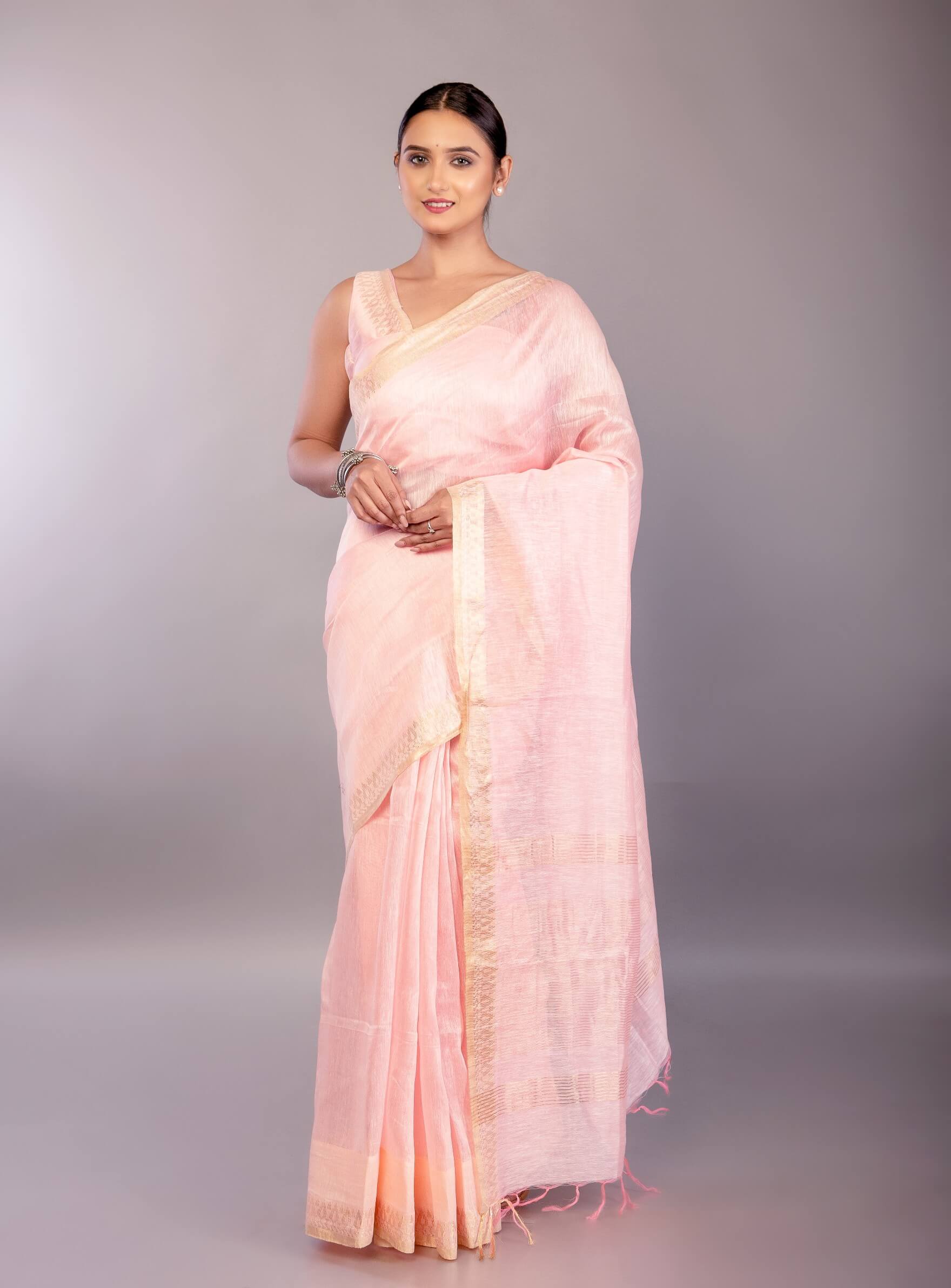 Baby Pink Silk Linen Saree with Contrasting Gold Zari Border - Anvi Couture