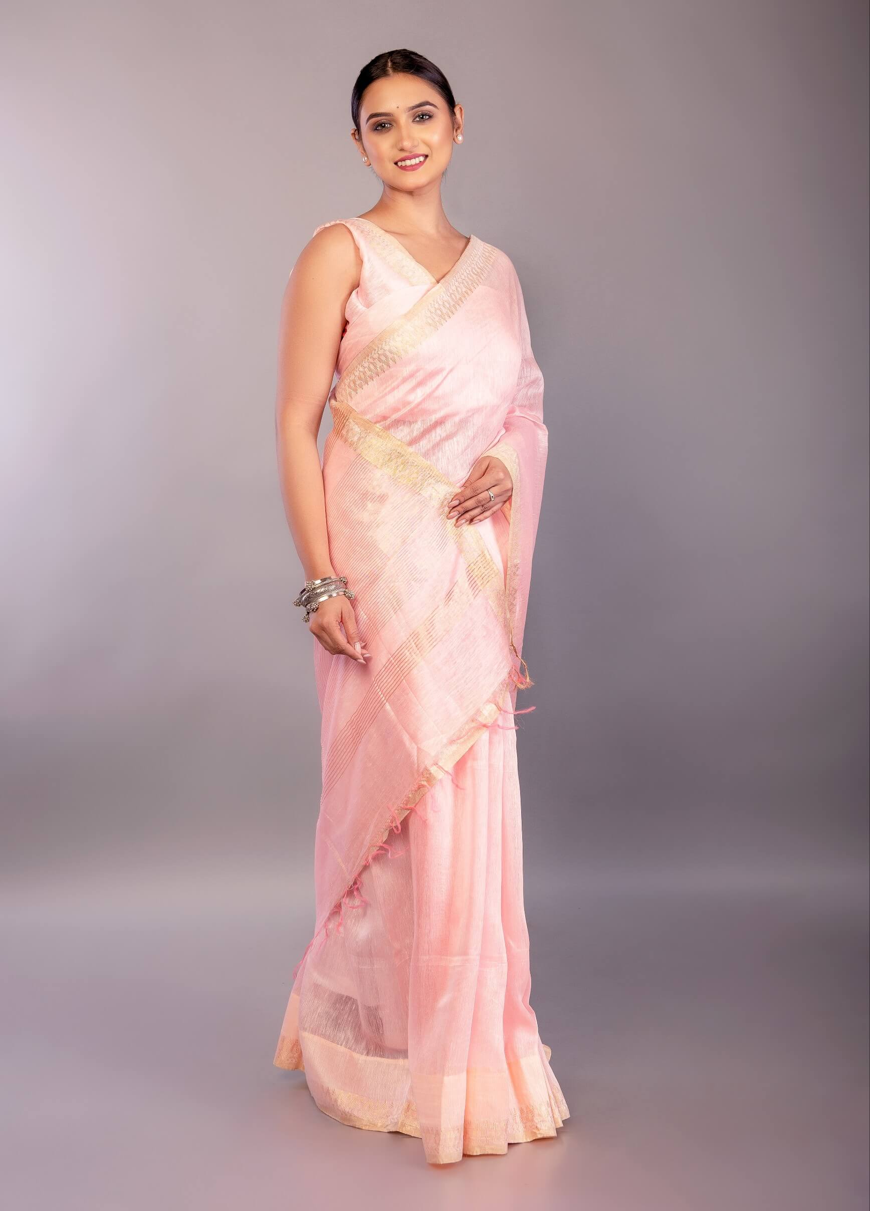 Baby Pink Silk Linen Saree with Contrasting Gold Zari Border - Anvi Couture