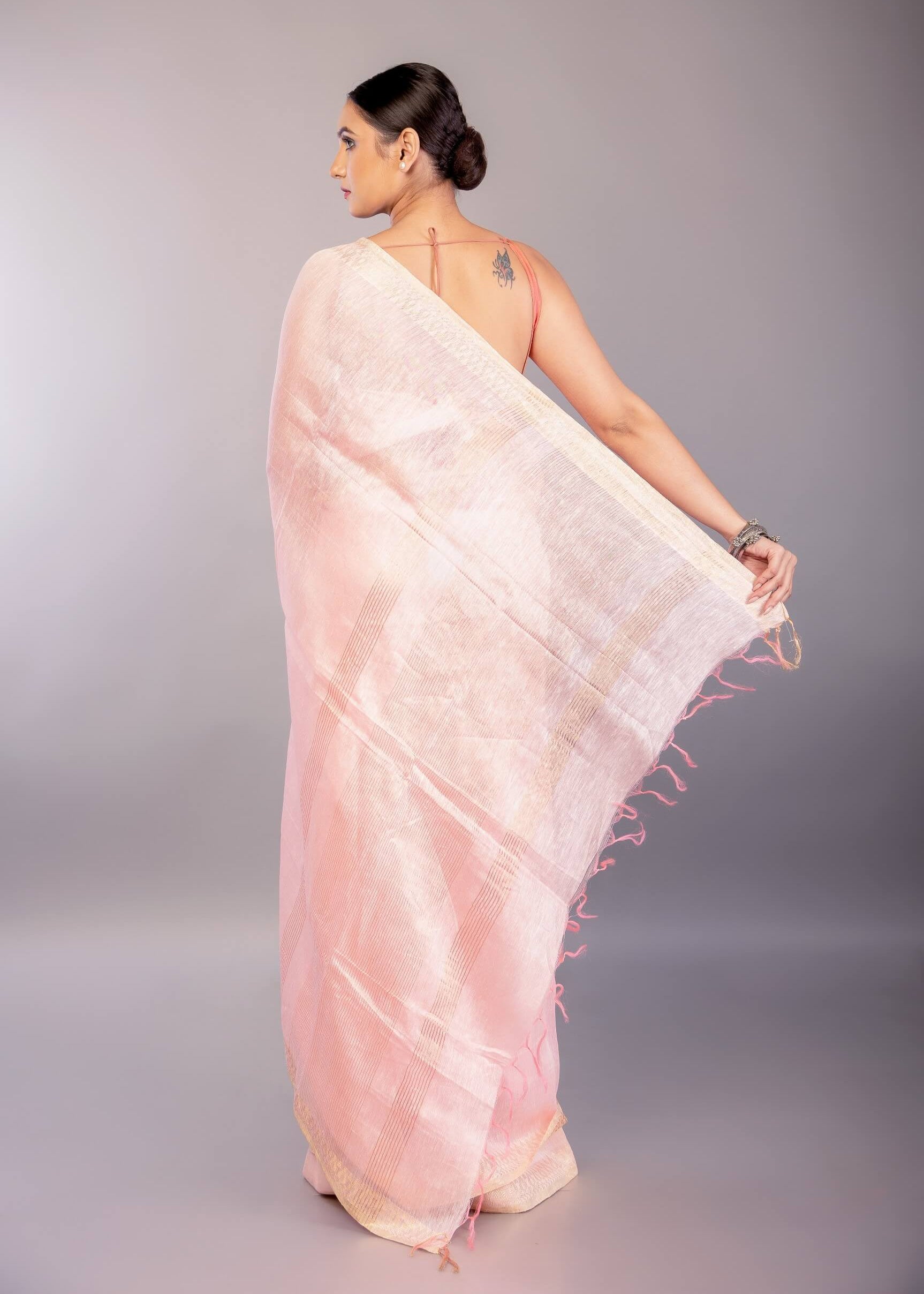 Baby Pink Silk Linen Saree with Contrasting Gold Zari Border - Anvi Couture