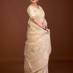 Off - White Printed Organza Saree with Embroidery Work and Lace Trim - Anvi Couture