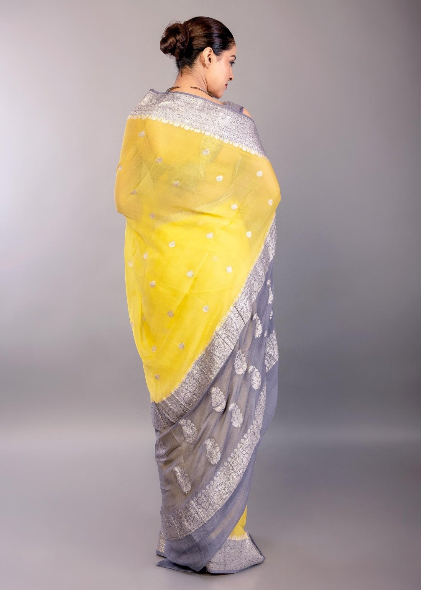 Yellow Khaddi Georgette Banarasi Saree with Contrasting Gray Zari Border - Anvi Couture