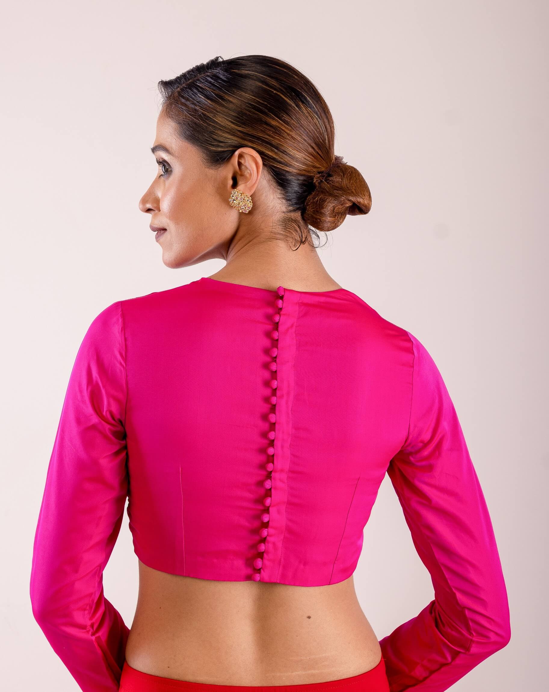 A Woman Wearing a Rani Pink Full Sleeve Formal Blouse with High Neck- Elegant Workwear Essential for Women: Anvi Couture - Image 4