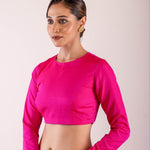 A woman dressed in a Rani Pink Full Sleeve Formal Blouse with High Neck- Elegant Workwear Essential for Women - Anvi Couture - Image 3