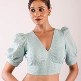 Woman wearing Light Blue Hakoba Blouse with Puff Sleeves and V Neckline- Chic and Casual Premium Quality Ethnic Wear - Anvi Couture - Image 2