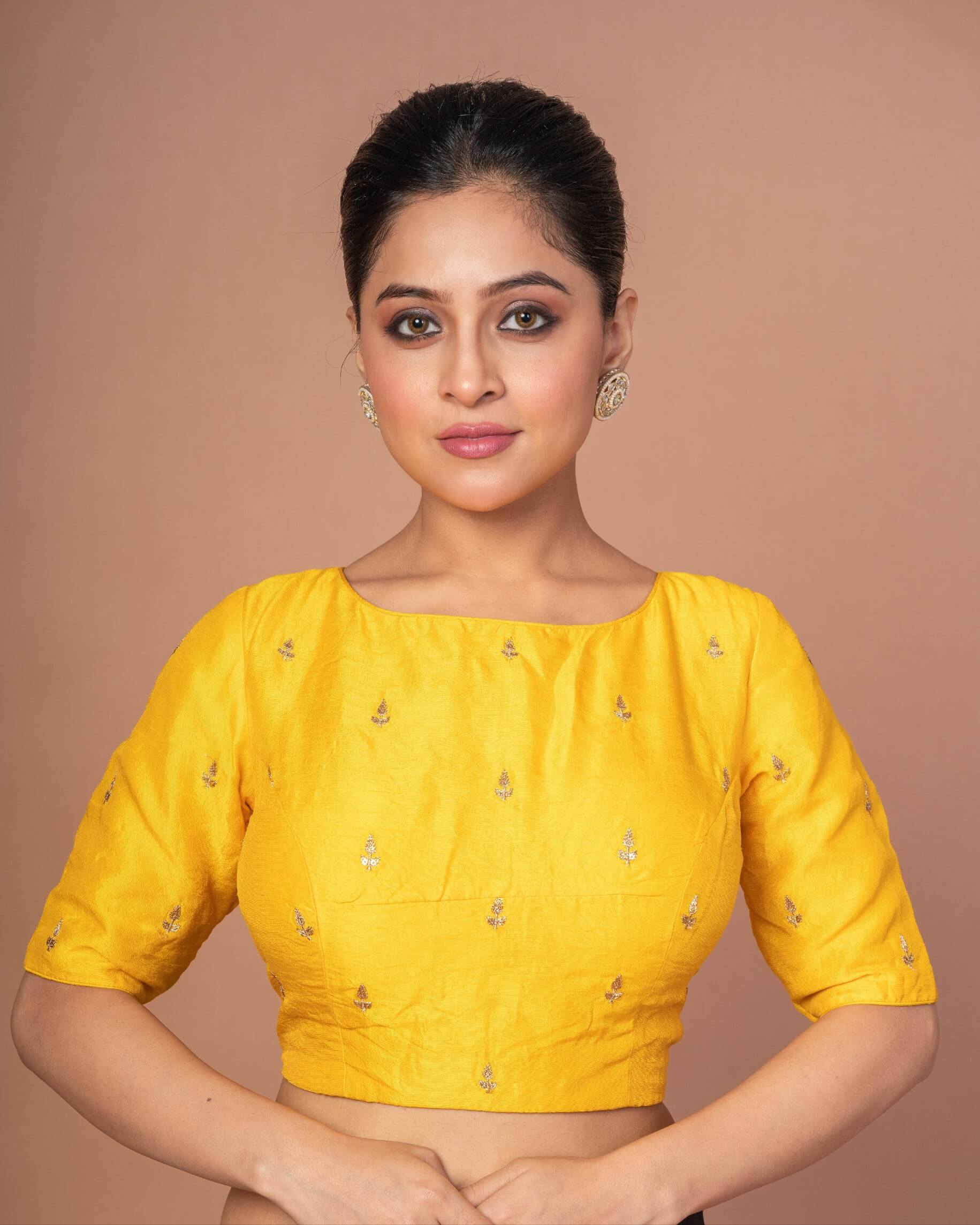 Woman Wearing a Yellow Raw Silk Blouse with Boat Neckline and Gold Floral Work: Anvi Couture - Image 1