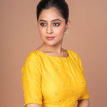 Woman wearing a Yellow Raw Silk Blouse with Boat Neckline and Gold Floral Work: Anvi Couture - Image 3