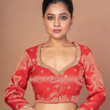 Woman Wearing a Red Tissue Silk Blouse with Hand Embroidered Work: Bridal Blouse - Anvi Couture - Image 1