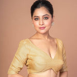 woman dressed in a Gold Tissue Silk V-Neckline Blouse with Elbow Sleeves: Festive Wear Blouses - Anvi Couture - Image 3