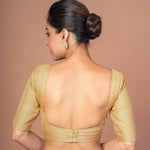 A Woman Dressed in a Gold Tissue Silk V-Neckline Blouse with Elbow Sleeves: Anvi Couture - Image 4