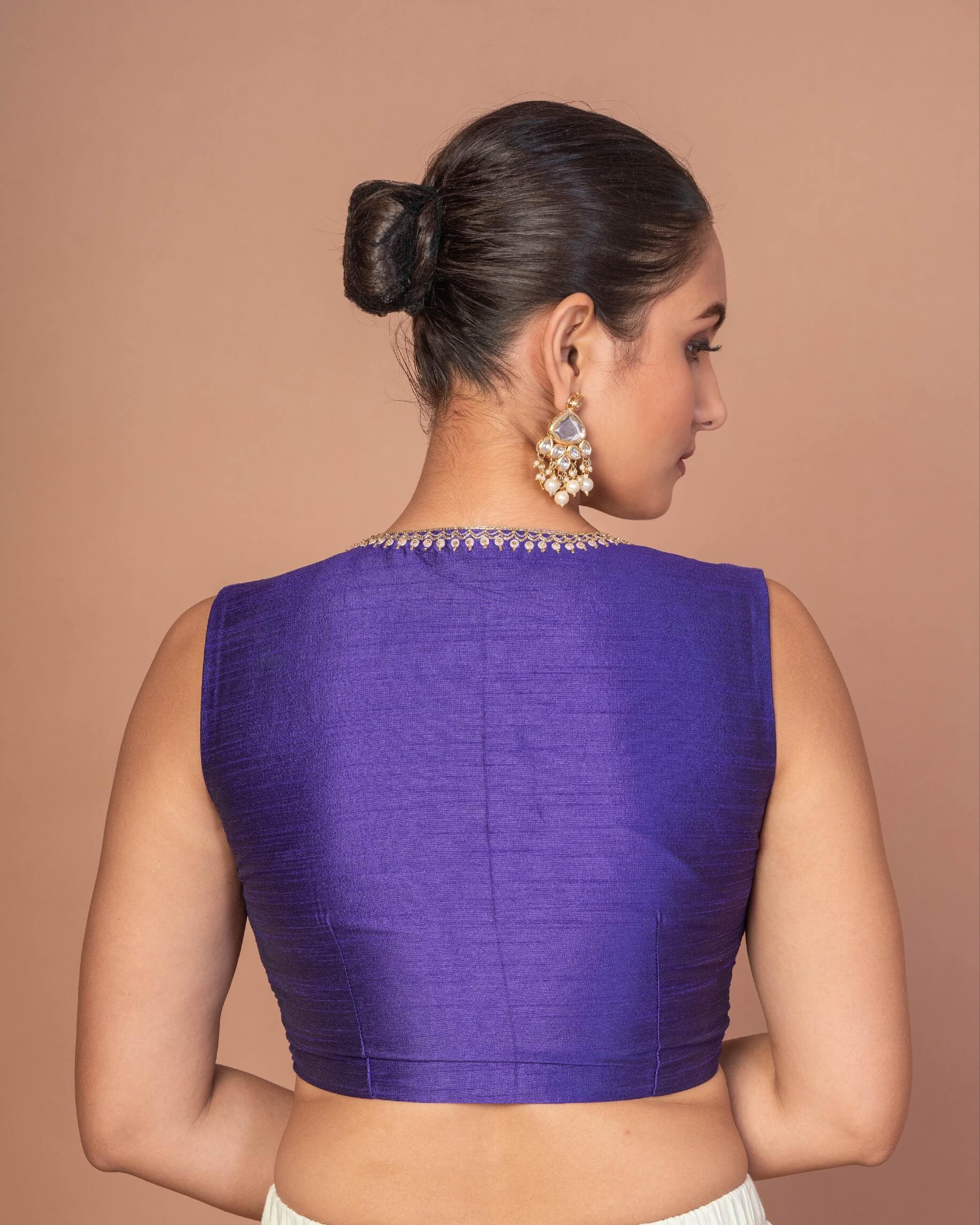 A Woman Wearing a Royal Blue V-Neckline Sleeveless Blouse with Embroidered Work: Anvi Couture - Image 3